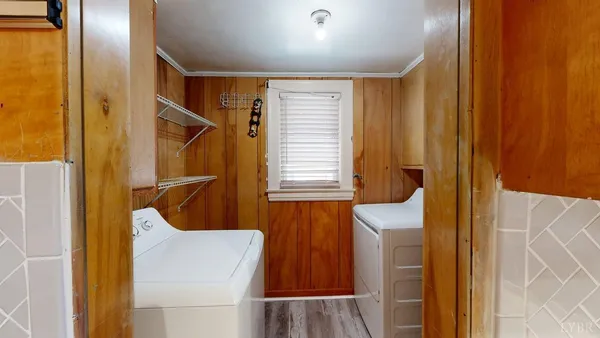 a bathroom with a shower and a tub