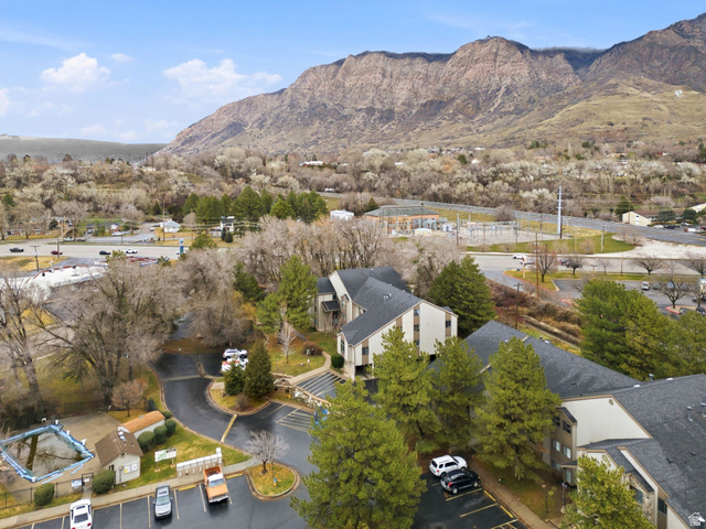 1175 Canyon Road, Unit 77 Ogden, UT 84404 - Photo 13 of 16 Aerial perspective of suburban area with a mountainous background