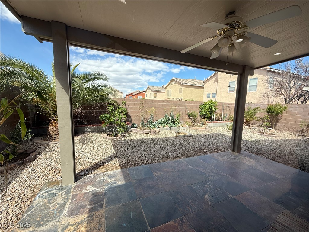 7062 Russell Ranch Avenue Las Vegas, NV 89113 - Photo 17 of 32 View of patio / terrace with a fenced backyard and ceiling fan