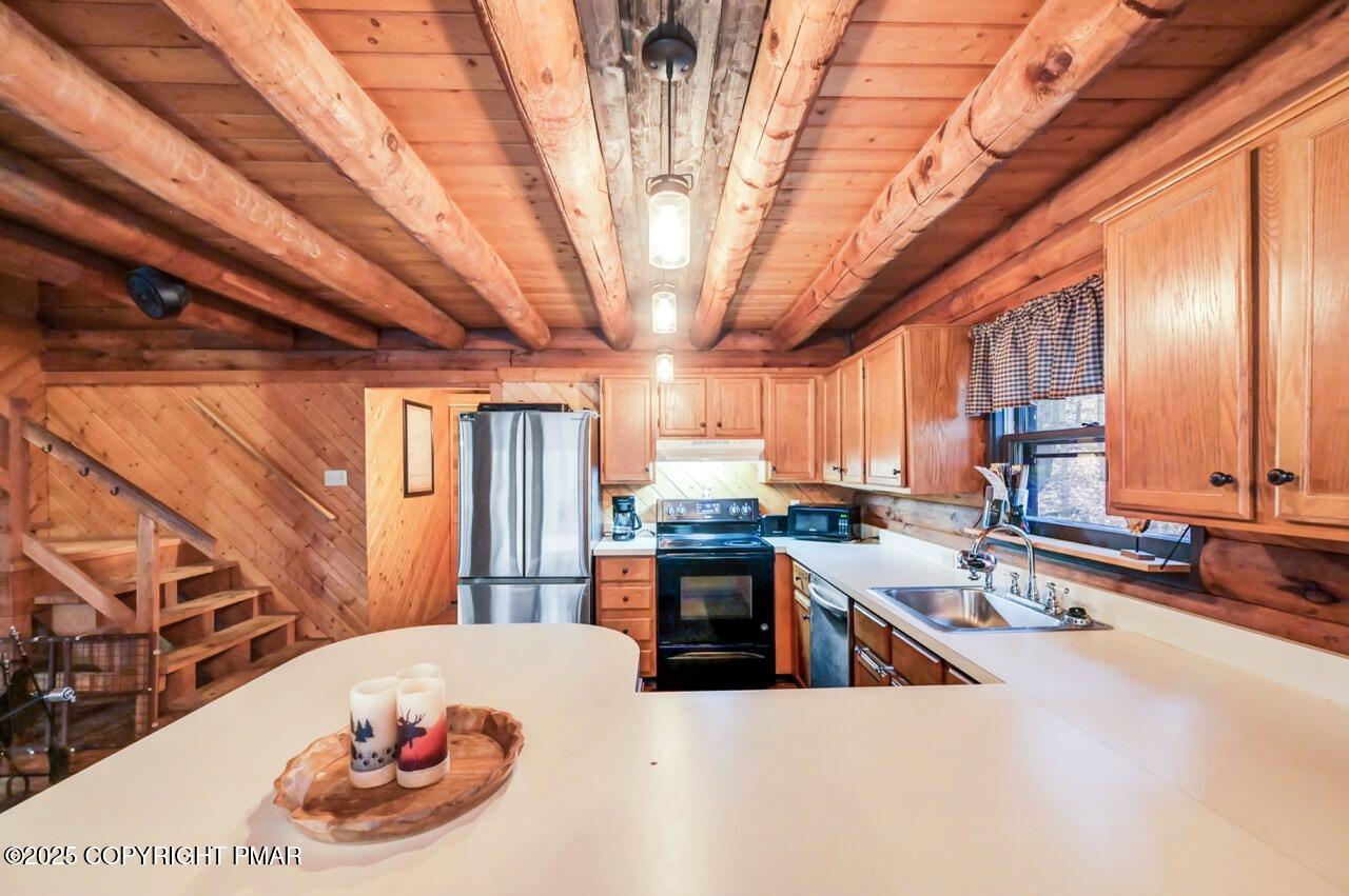 185 Whispering Pine Road Kunkletown, PA 18058 - Photo 16 of 65 a kitchen with a large window and a counter space