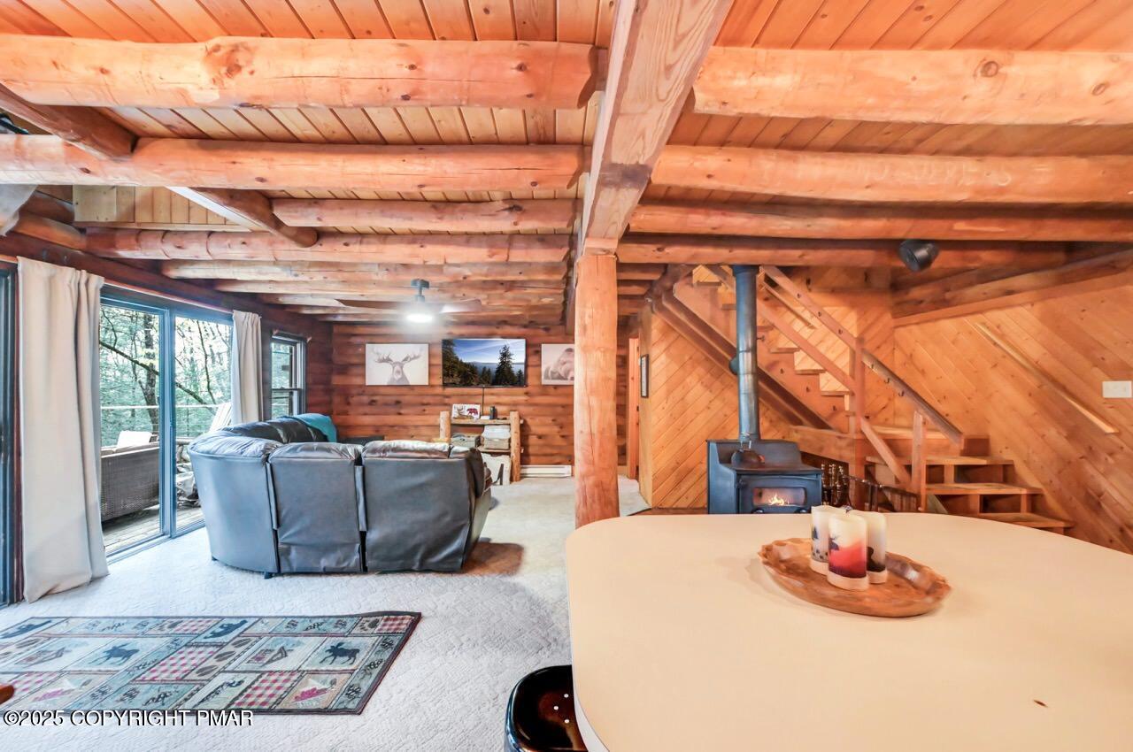 185 Whispering Pine Road Kunkletown, PA 18058 - Photo 18 of 65 a living room with furniture and a window