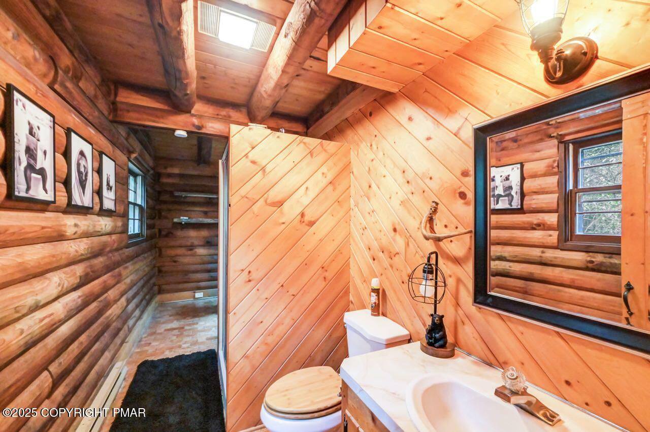185 Whispering Pine Road Kunkletown, PA 18058 - Photo 22 of 65 a bathroom with a sink and a toilet