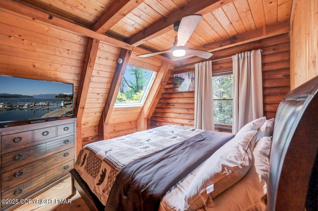 185 Whispering Pine Road Kunkletown, PA 18058 - Photo 37 of 65 a bed sitting in a bedroom next to a window