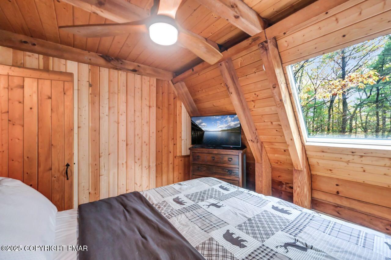 185 Whispering Pine Road Kunkletown, PA 18058 - Photo 39 of 65 a bedroom with a bed and a television