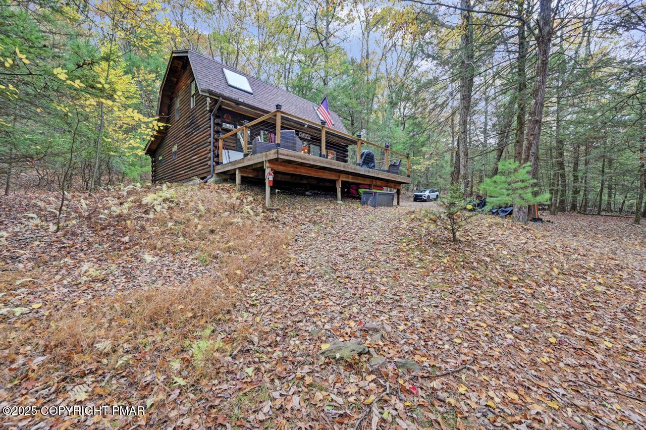 185 Whispering Pine Road Kunkletown, PA 18058 - Photo 45 of 65 a house with trees in front of it