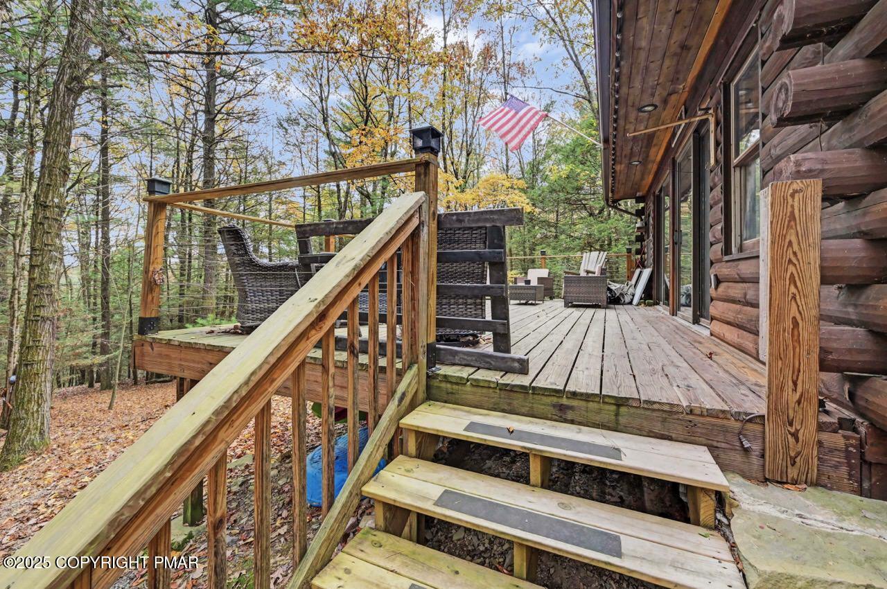 185 Whispering Pine Road Kunkletown, PA 18058 - Photo 49 of 65 a view of balcony with wooden floor and fence