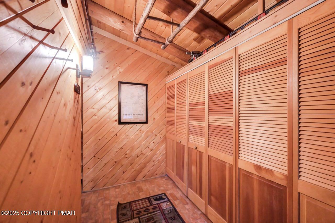 185 Whispering Pine Road Kunkletown, PA 18058 - Photo 5 of 65 a backyard of a house with wooden floor