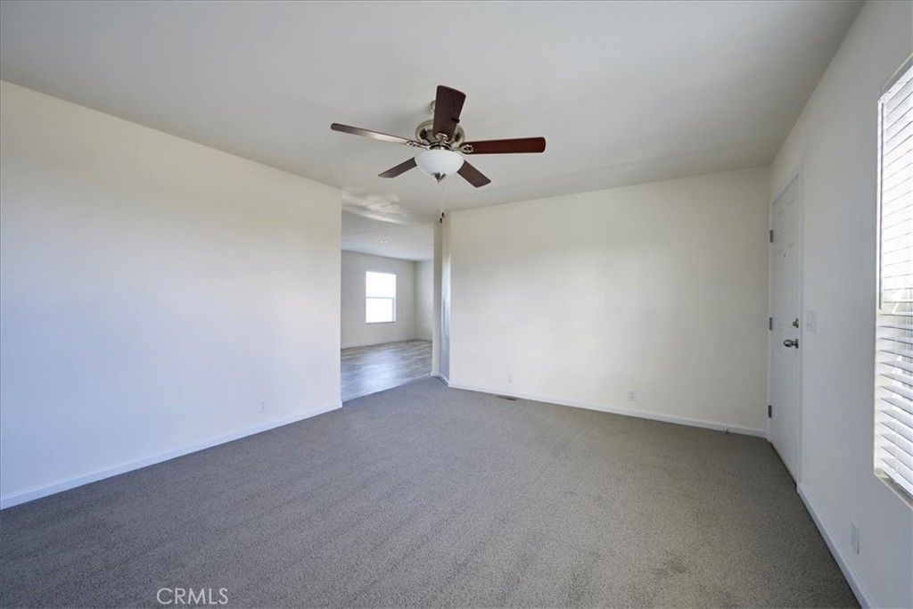 12594 Atsina Road Phelan, CA 92371 - Photo 9 of 37 a view of an empty room