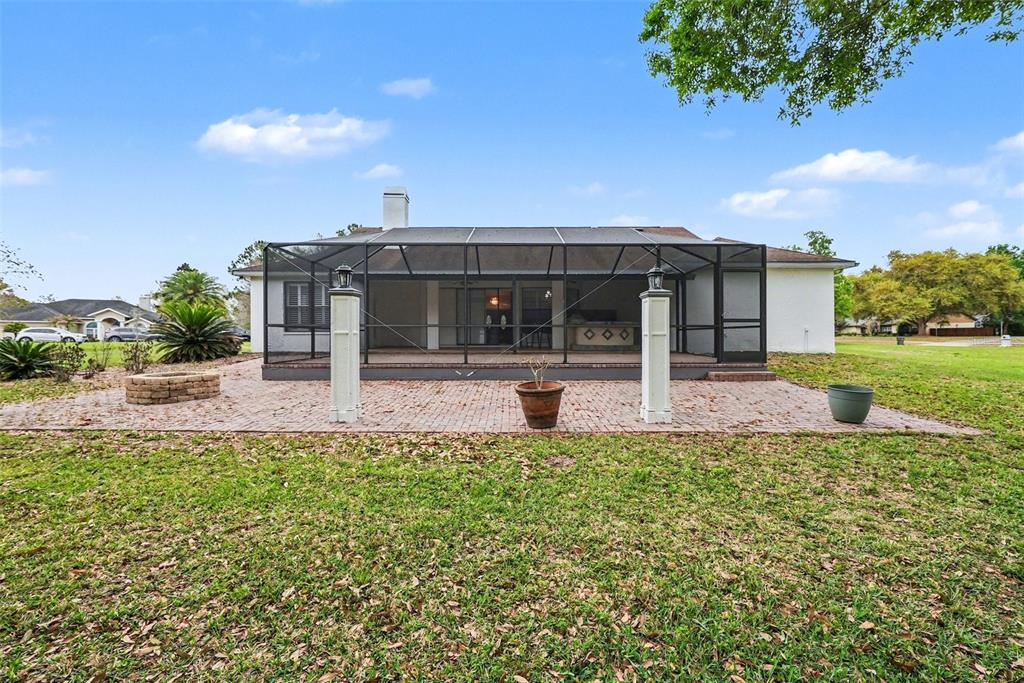 19216 Ridgelake Drive Lutz, FL 33549 - Photo 28 of 31 a view of a house with swimming pool and sitting area