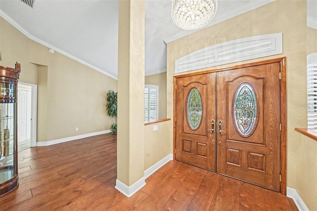 19216 Ridgelake Drive Lutz, FL 33549 - Photo 4 of 31 a view of an entryway with wooden floor