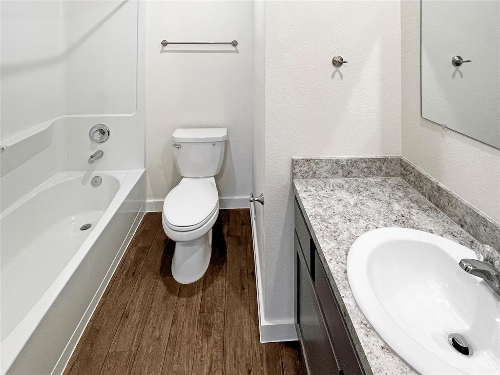 12603 Telge Road, Unit 26 EF Cypress, TX 77429 - Photo 14 of 25 Bathroom with large vanity and tub/shower combination.