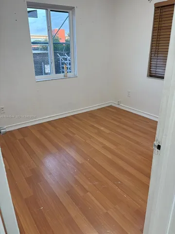 an empty room with window