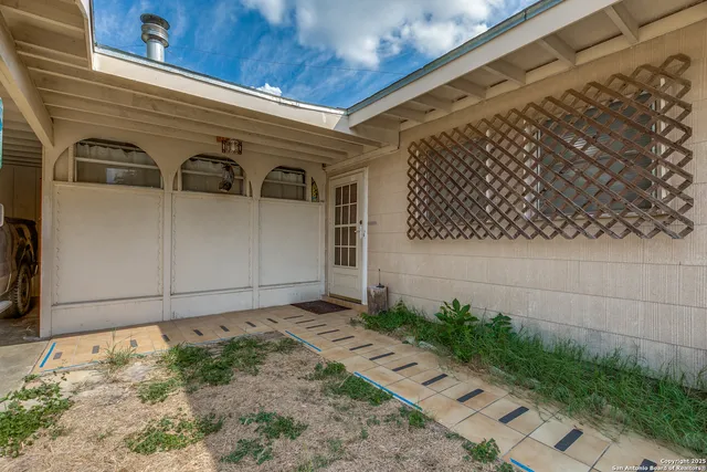a house view with a garden space