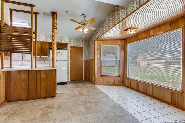 an empty room with windows