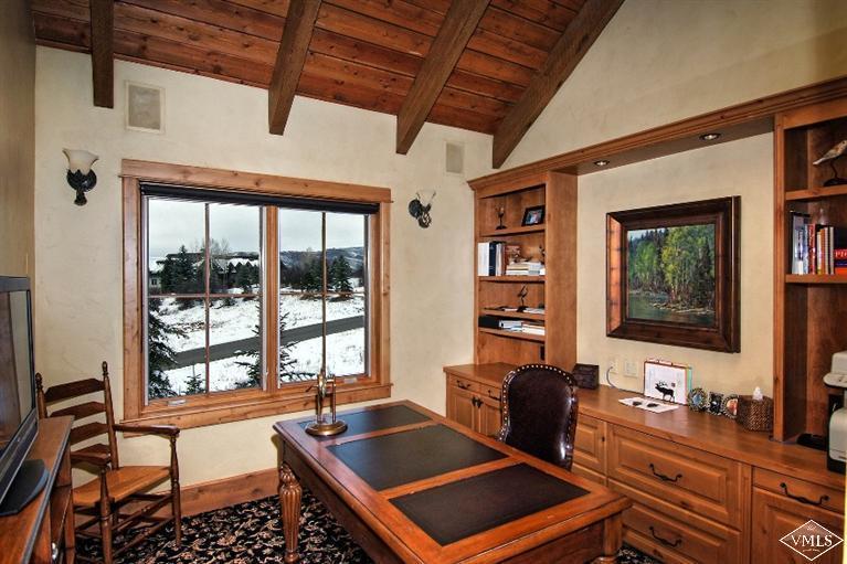 308 Bearden Road Edwards, CO 81632 - Photo 11 of 23 a room with gym equipment and a large window