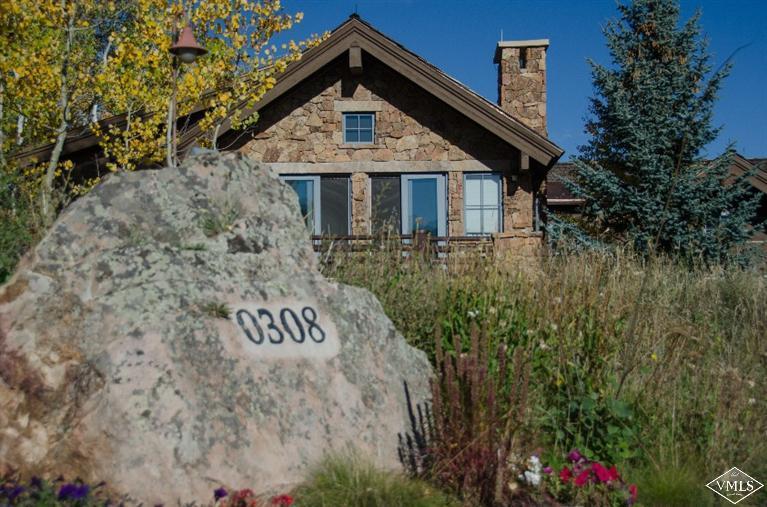 308 Bearden Road Edwards, CO 81632 - Photo 23 of 23 a front view of a house with a yard and garage