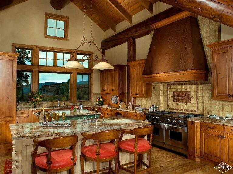 308 Bearden Road Edwards, CO 81632 - Photo 5 of 23 a kitchen with stainless steel appliances granite countertop a stove and a sink