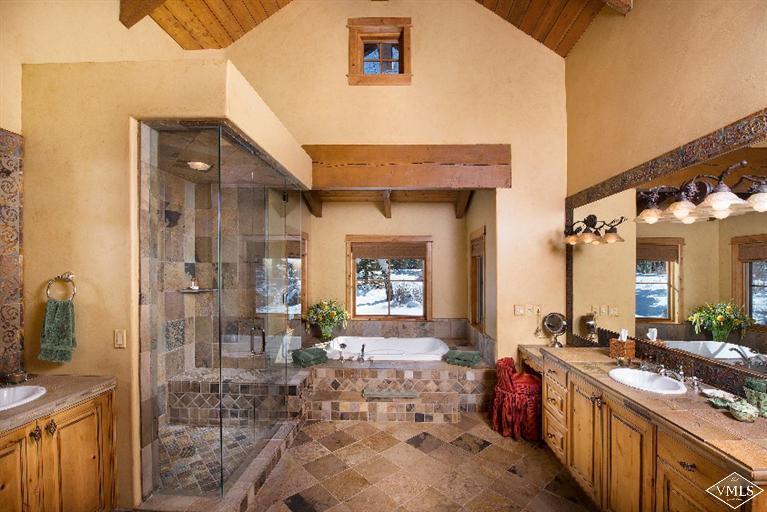 308 Bearden Road Edwards, CO 81632 - Photo 10 of 23 a bathroom with a sink a mirror and a shower