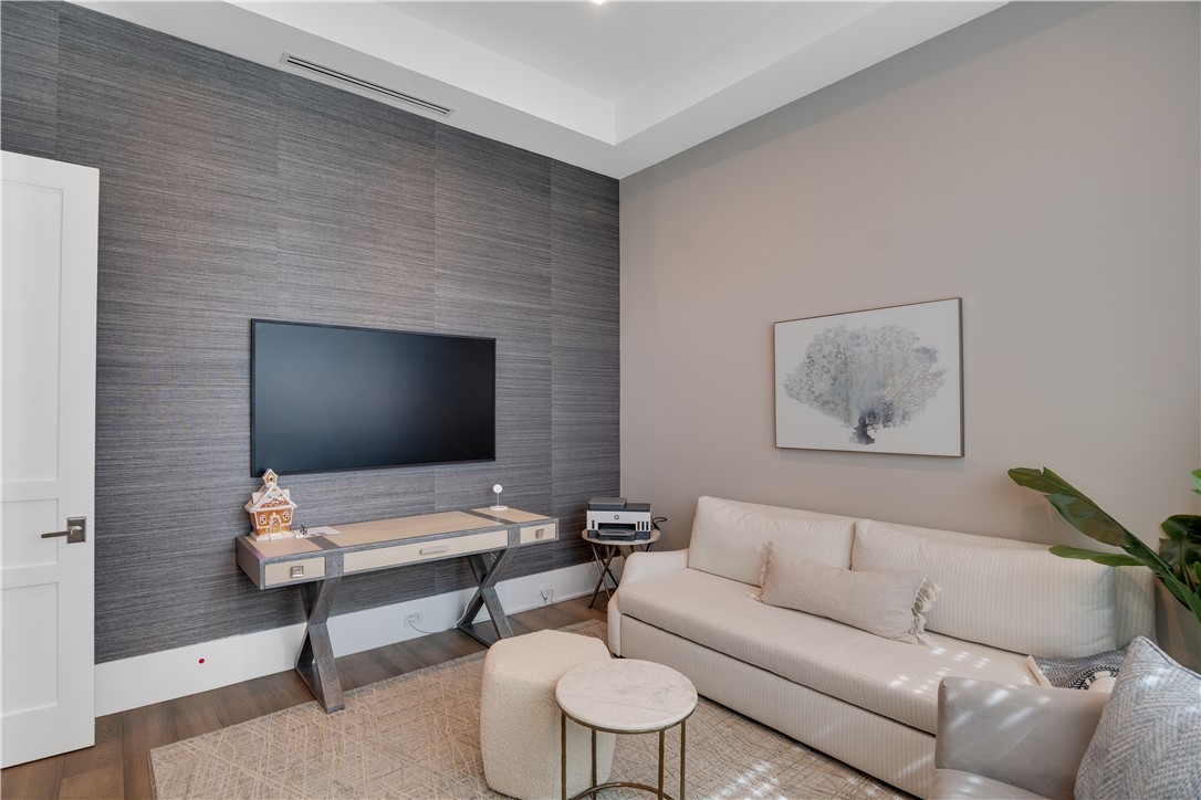 918 Surfsedge Way Indian River Shores, FL 32963 - Photo 12 of 32 a living room with furniture and a flat screen tv