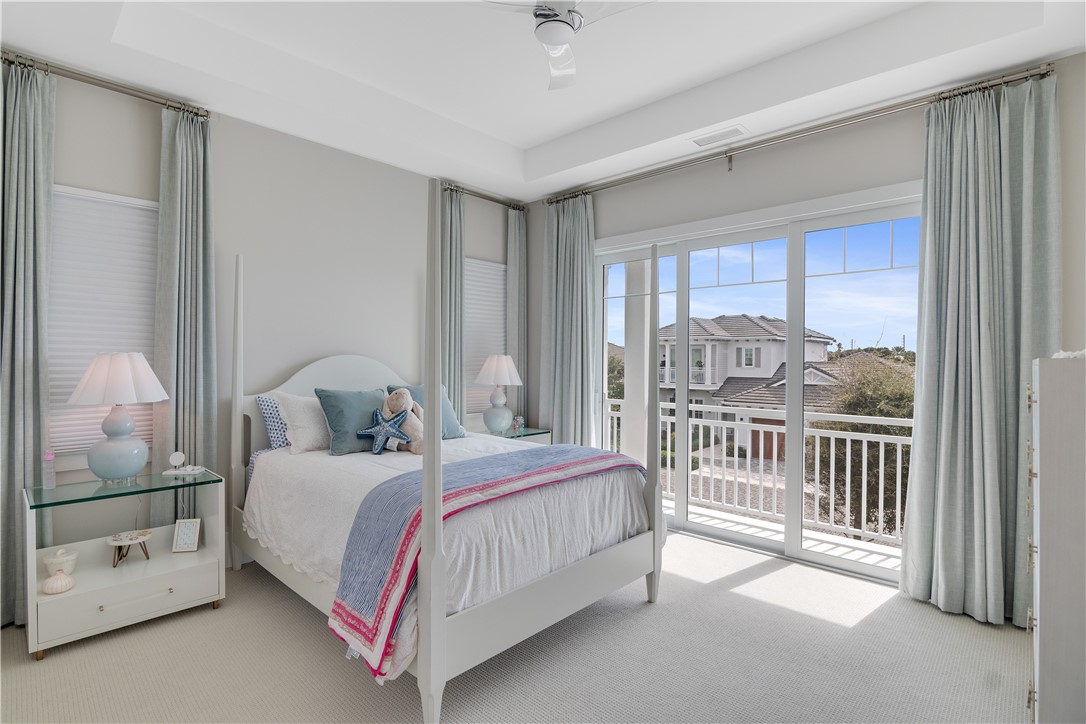 918 Surfsedge Way Indian River Shores, FL 32963 - Photo 14 of 32 a bedroom with a bed and a window