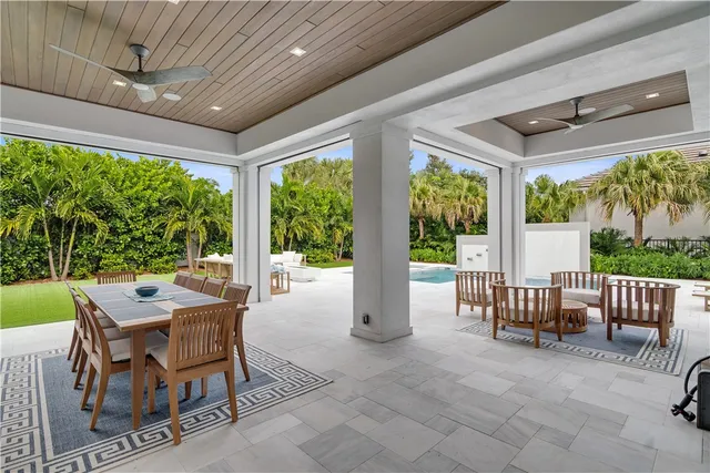 a view of a patio with a backyard
