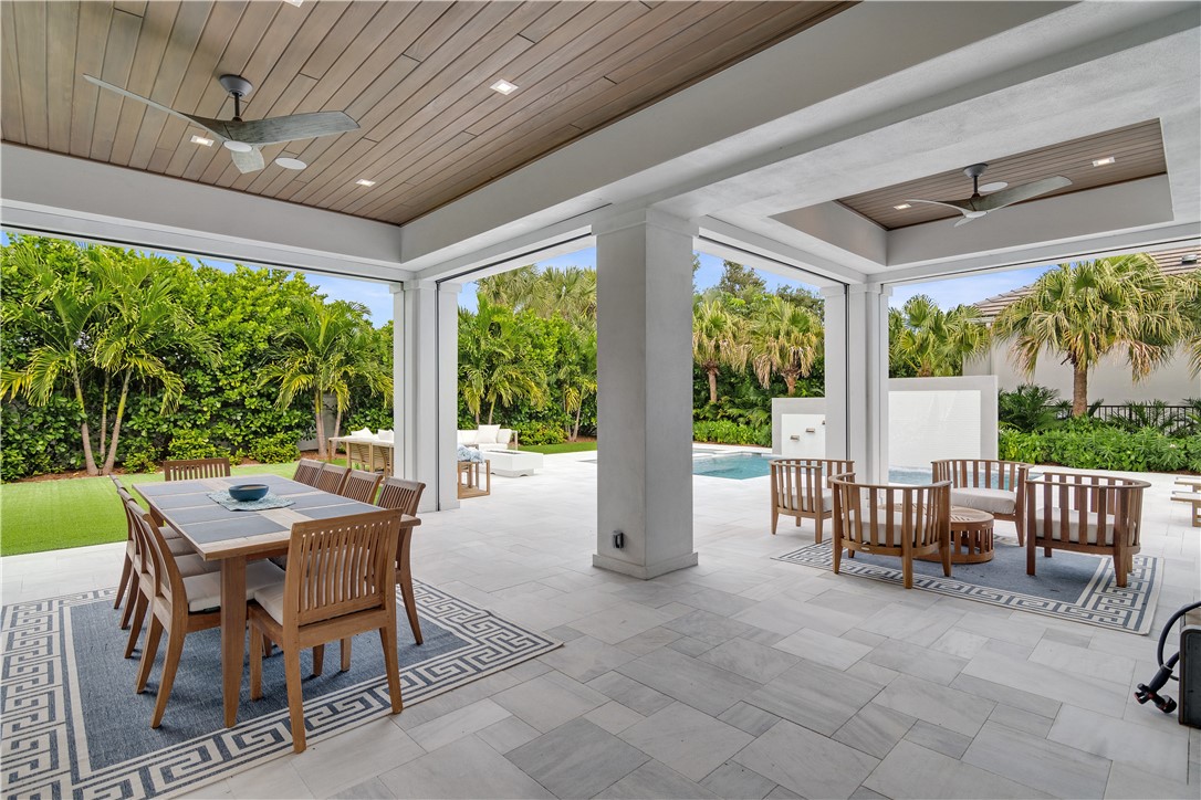 918 Surfsedge Way Indian River Shores, FL 32963 - Photo 16 of 32 a view of a patio with a backyard