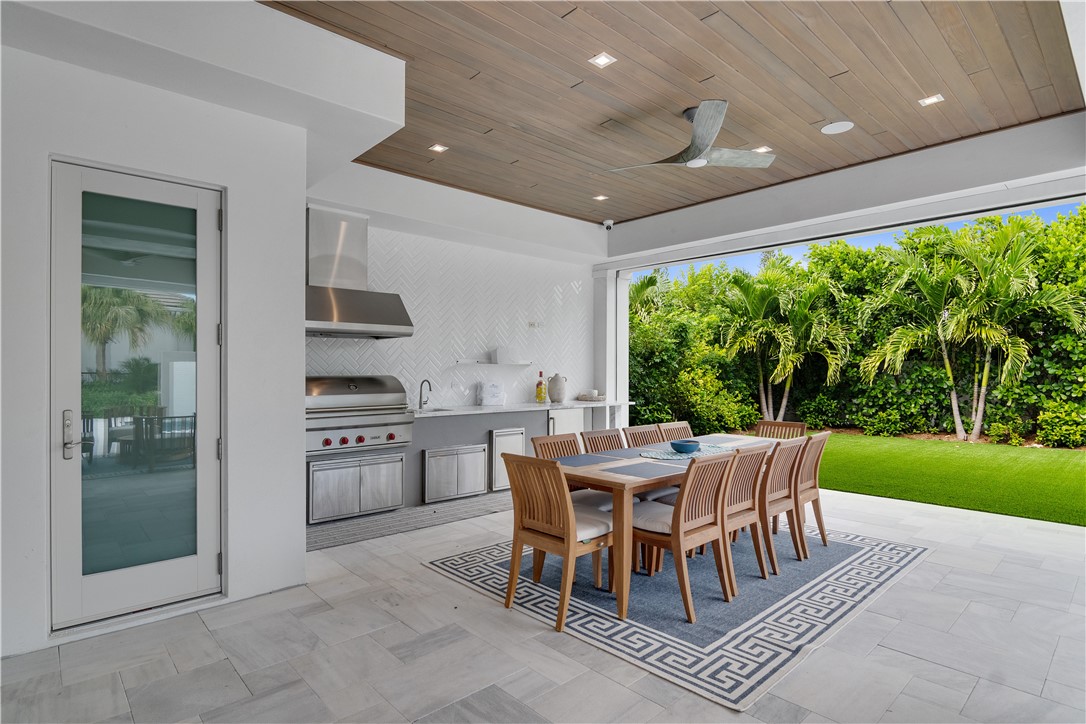 918 Surfsedge Way Indian River Shores, FL 32963 - Photo 17 of 32 a dining room with furniture and window