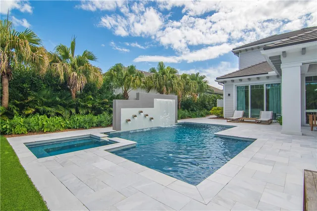 a view of a backyard of the house