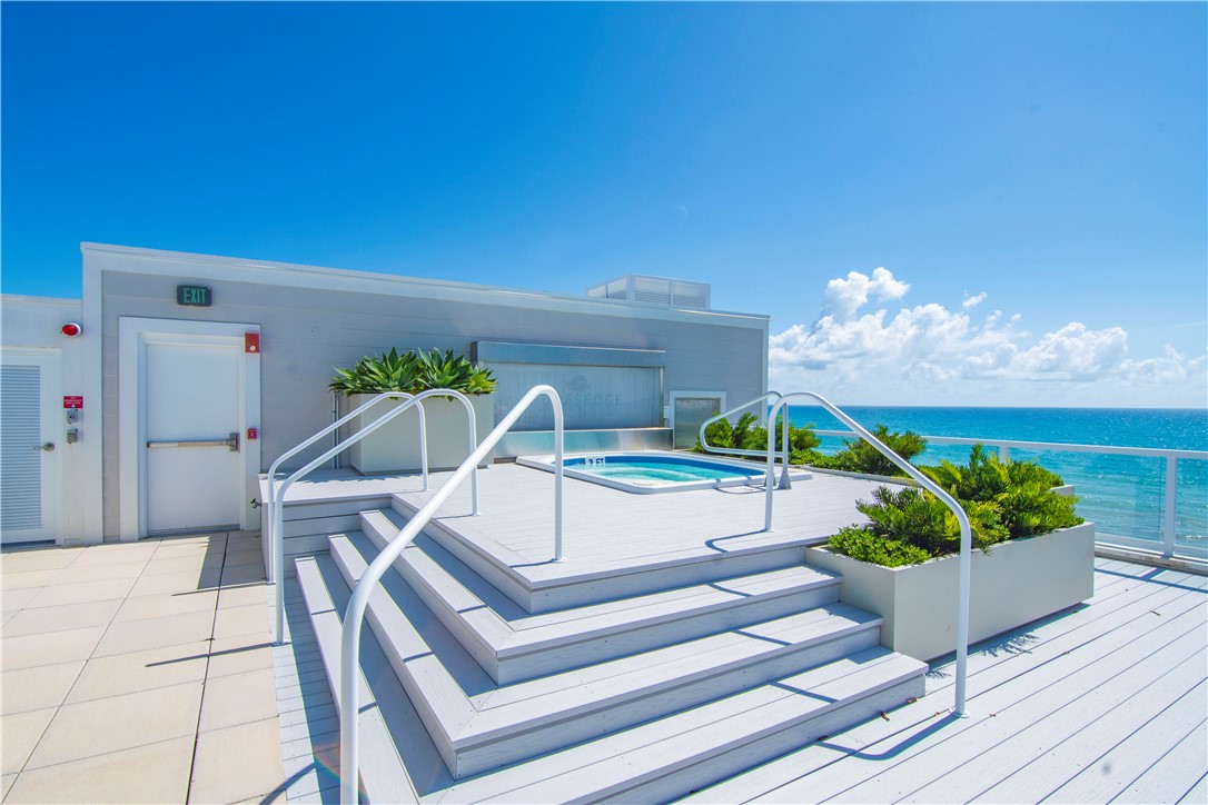 918 Surfsedge Way Indian River Shores, FL 32963 - Photo 25 of 32 a view of a dining room with furniture and a potted plant