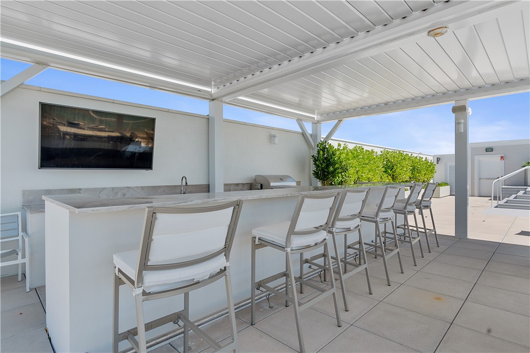 918 Surfsedge Way Indian River Shores, FL 32963 - Photo 28 of 32 a dining room with furniture and window