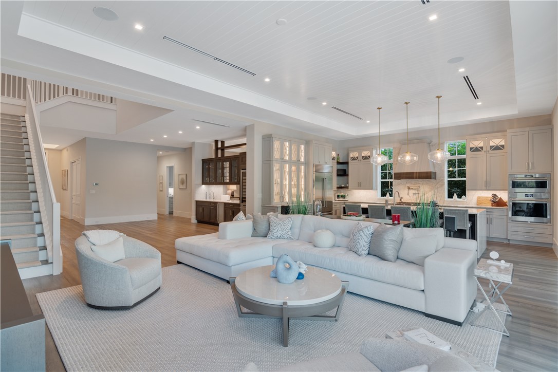 918 Surfsedge Way Indian River Shores, FL 32963 - Photo 4 of 32 a living room with furniture and a large window