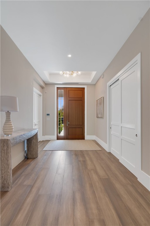 918 Surfsedge Way Indian River Shores, FL 32963 - Photo 9 of 32 a view of an empty room with wooden floor and a window