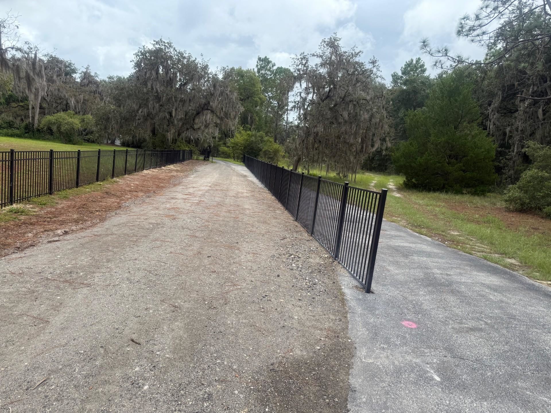 397 Southeast County Road 18A Starke, FL 32091 - Photo 77 of 77 View of driveway featuring a forest Feel