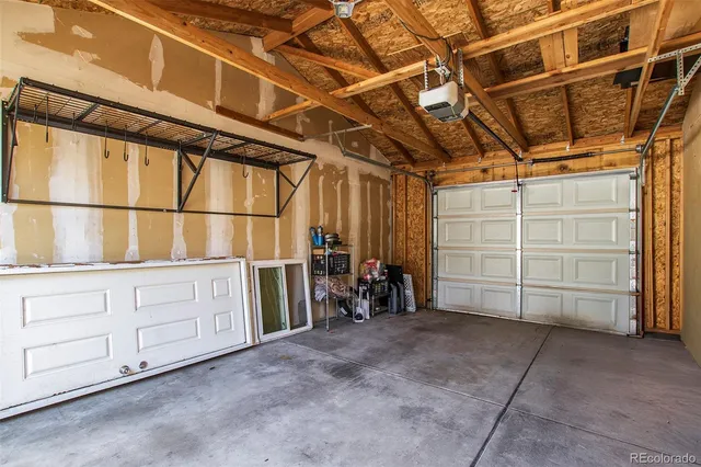 a view of a garage with storage
