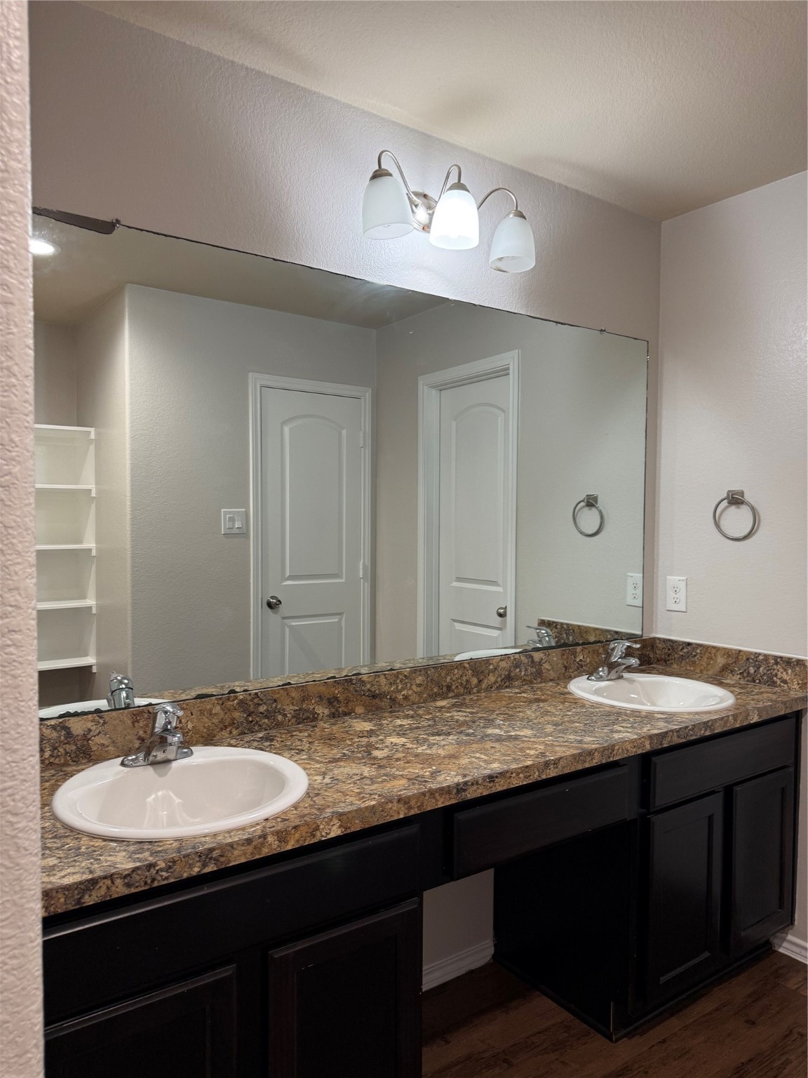 15415 Bosque Viejo Trail Channelview, TX 77530 - Photo 15 of 20 a bathroom with a granite countertop sink and a mirror