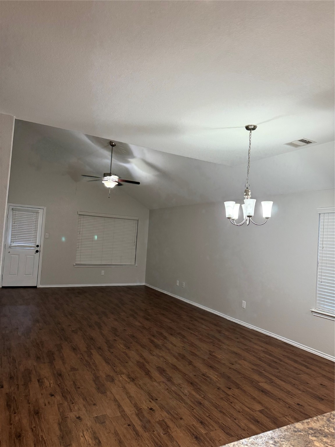 15415 Bosque Viejo Trail Channelview, TX 77530 - Photo 8 of 20 a view of a room with wooden floor and ceiling fan