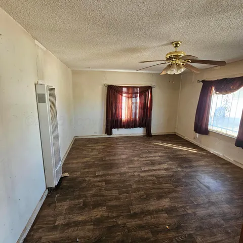 a view of a livingroom with a furniture