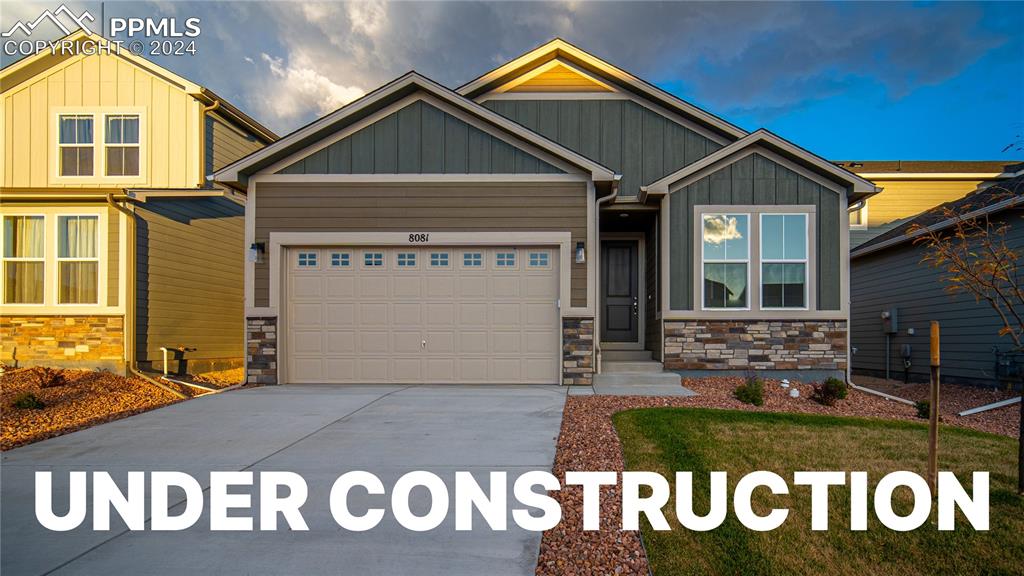 8093 Yellowleaf Place Colorado Springs, CO 80908 - Photo 1 of 23 a front view of house with a garden