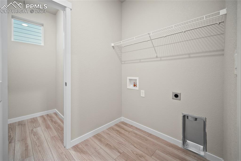 8093 Yellowleaf Place Colorado Springs, CO 80908 - Photo 22 of 23 a view of small space with wooden floor