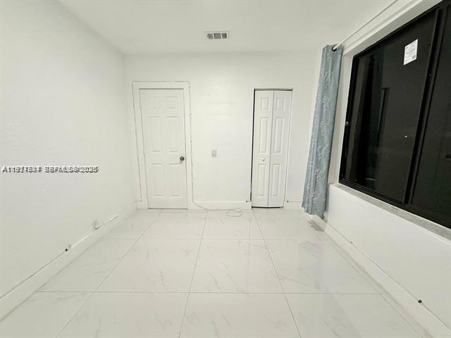 2369 Southwest 17th Terrace, Unit 2369 Miami, FL 33145 - Photo 12 of 25 a view of an empty room
