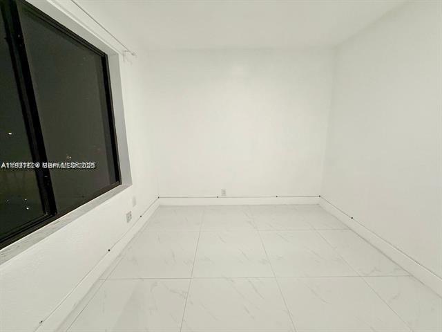 2369 Southwest 17th Terrace, Unit 2369 Miami, FL 33145 - Photo 13 of 25 a view of an empty room