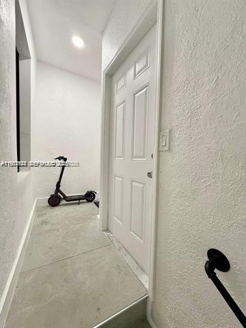 2369 Southwest 17th Terrace, Unit 2369 Miami, FL 33145 - Photo 23 of 25 a view of a room with gym equipment