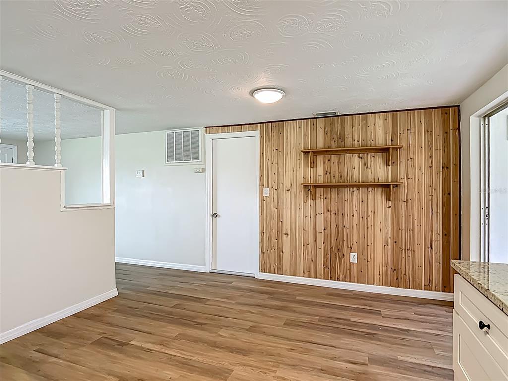 6632 Sierra Terrace New Port Richey, FL 34652 - Photo 14 of 49 a view of entryway with wooden floor