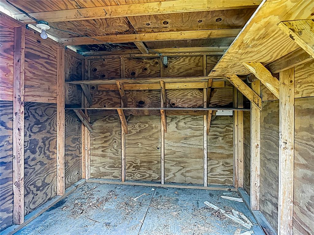 6632 Sierra Terrace New Port Richey, FL 34652 - Photo 34 of 49 a view of a room with wooden walls