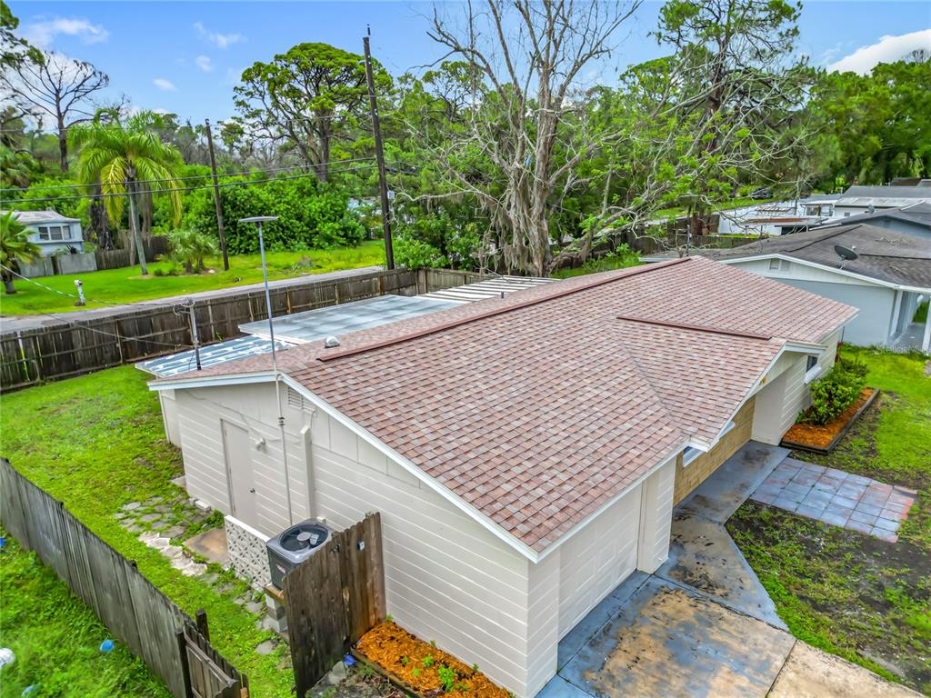 6632 Sierra Terrace New Port Richey, FL 34652 - Photo 40 of 49 an aerial view of a house having yard