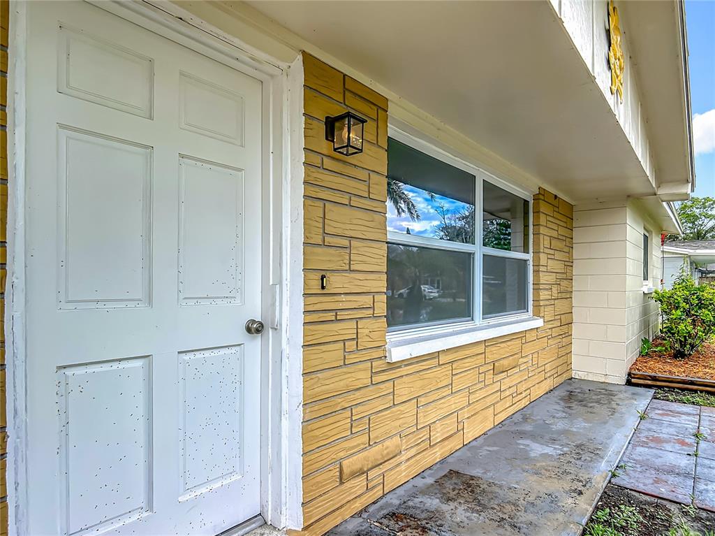 6632 Sierra Terrace New Port Richey, FL 34652 - Photo 4 of 49 a view of entrance door of the house
