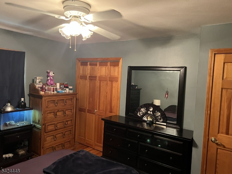 20 Nottingham Drive Howell, NJ 07731 - Photo 15 of 21 a room with cabinets and wooden floor