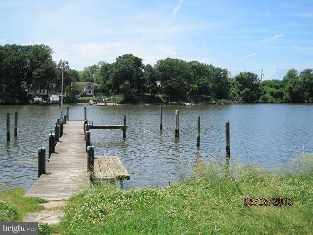 8009 Shore Road Baltimore, MD 21222 - Photo 3 of 19 a view of a lake with houses in outdoor space