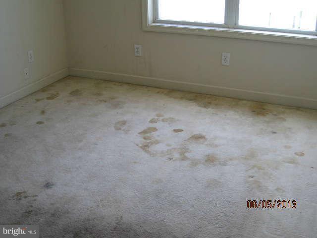 8009 Shore Road Baltimore, MD 21222 - Photo 10 of 19 a view of a window in an empty room