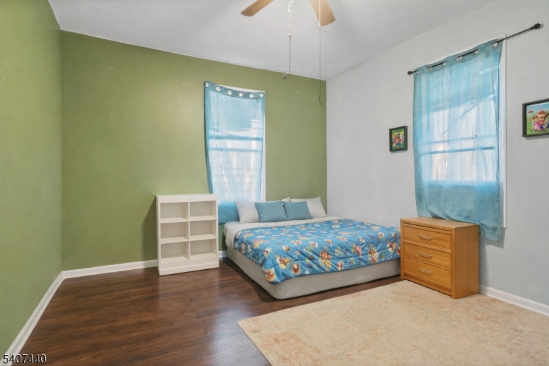 105 Huntington Terrace Newark, NJ 07112 - Photo 15 of 20 a bedroom with a bed and a window